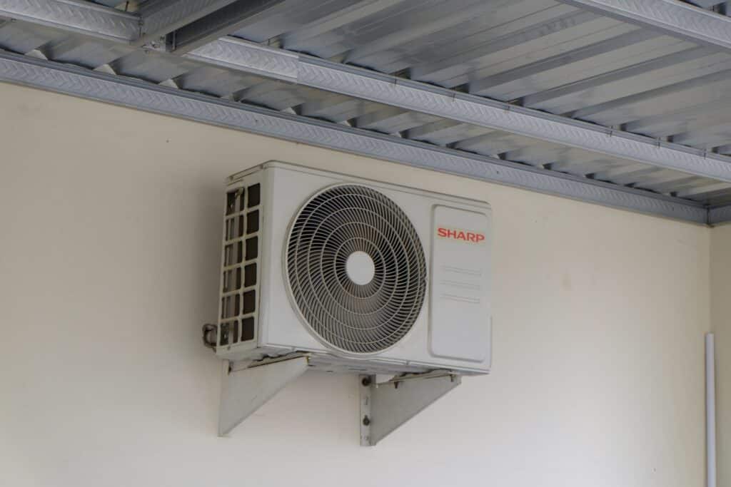 An air conditioning unit mounted on a wall.